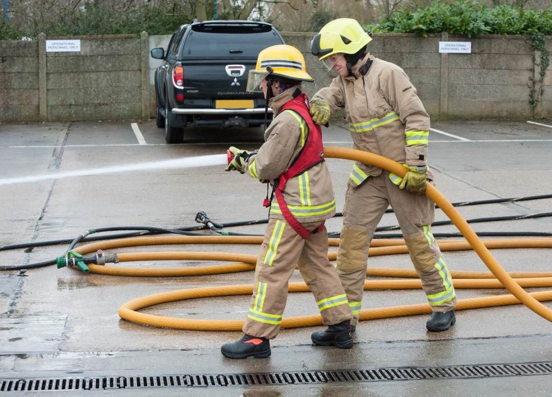 Using a fire hose at a Beds Fire Open Day Image: Bedfordshire Fire and Rescue Service